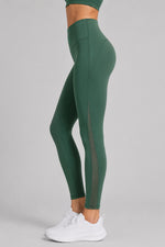 Dunkelgrüne Yogaleggings