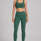 Dunkelgrüne Yogaleggings
