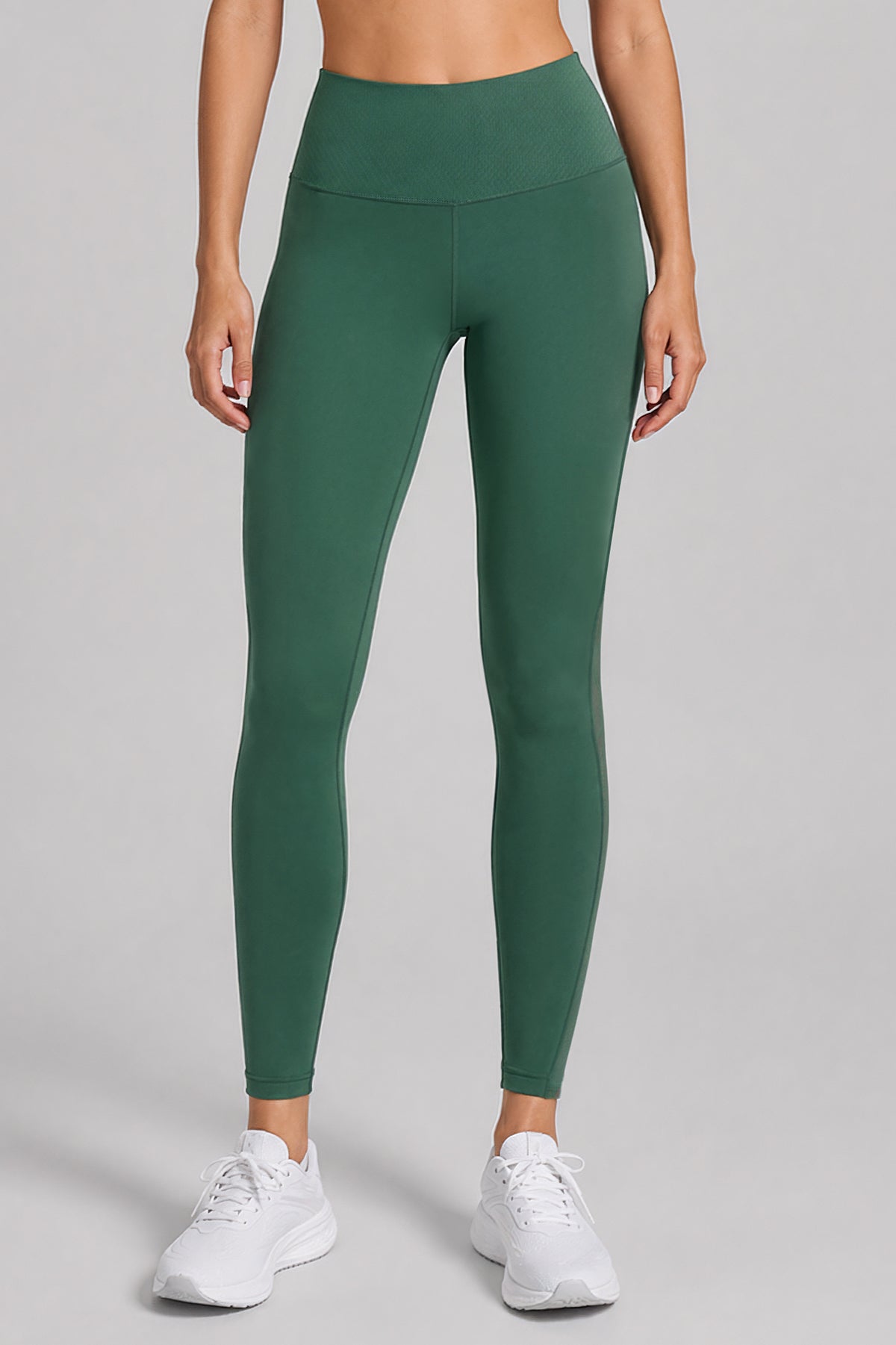 Dunkelgrüne Yogaleggings