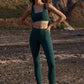 Dunkelgrüne Yogaleggings