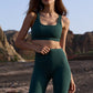 Dunkelgrüne Yogaleggings